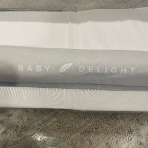 Brand new baby bassinet never used . Just took out of package to show size .